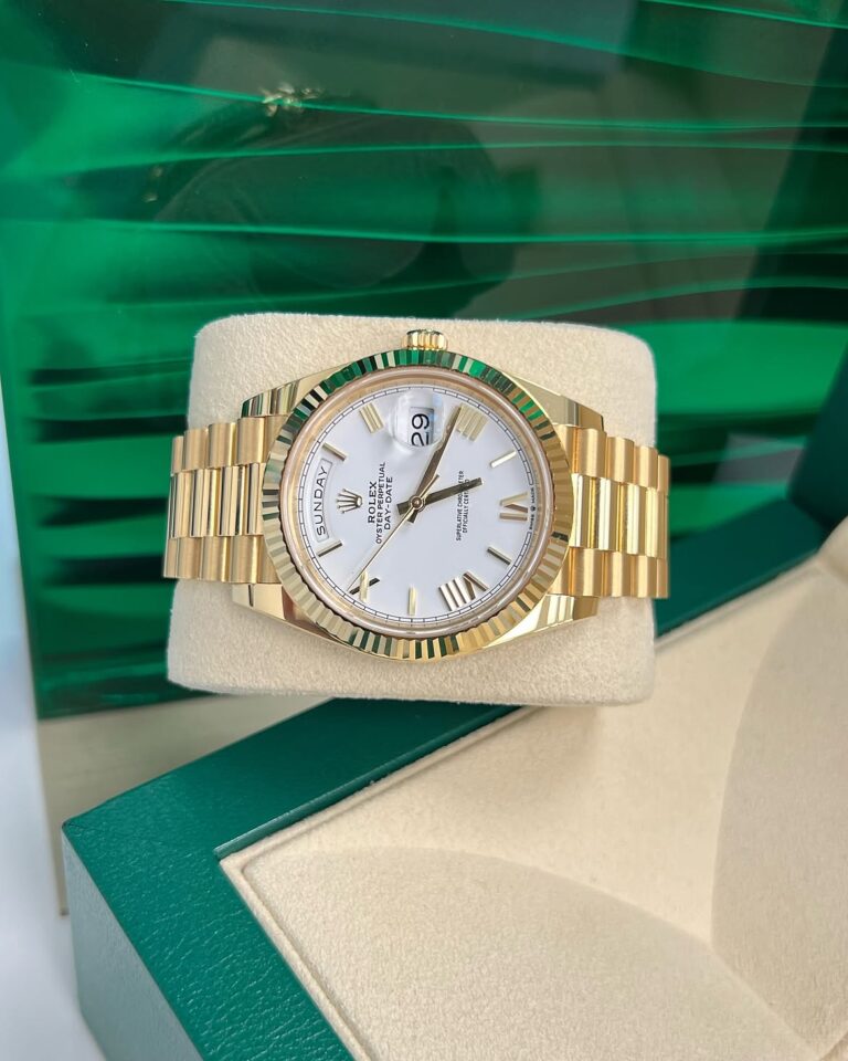 One of the cleanest DayDate 40s! 228238 yellow gold white dial DayDate 40 in stock & available t